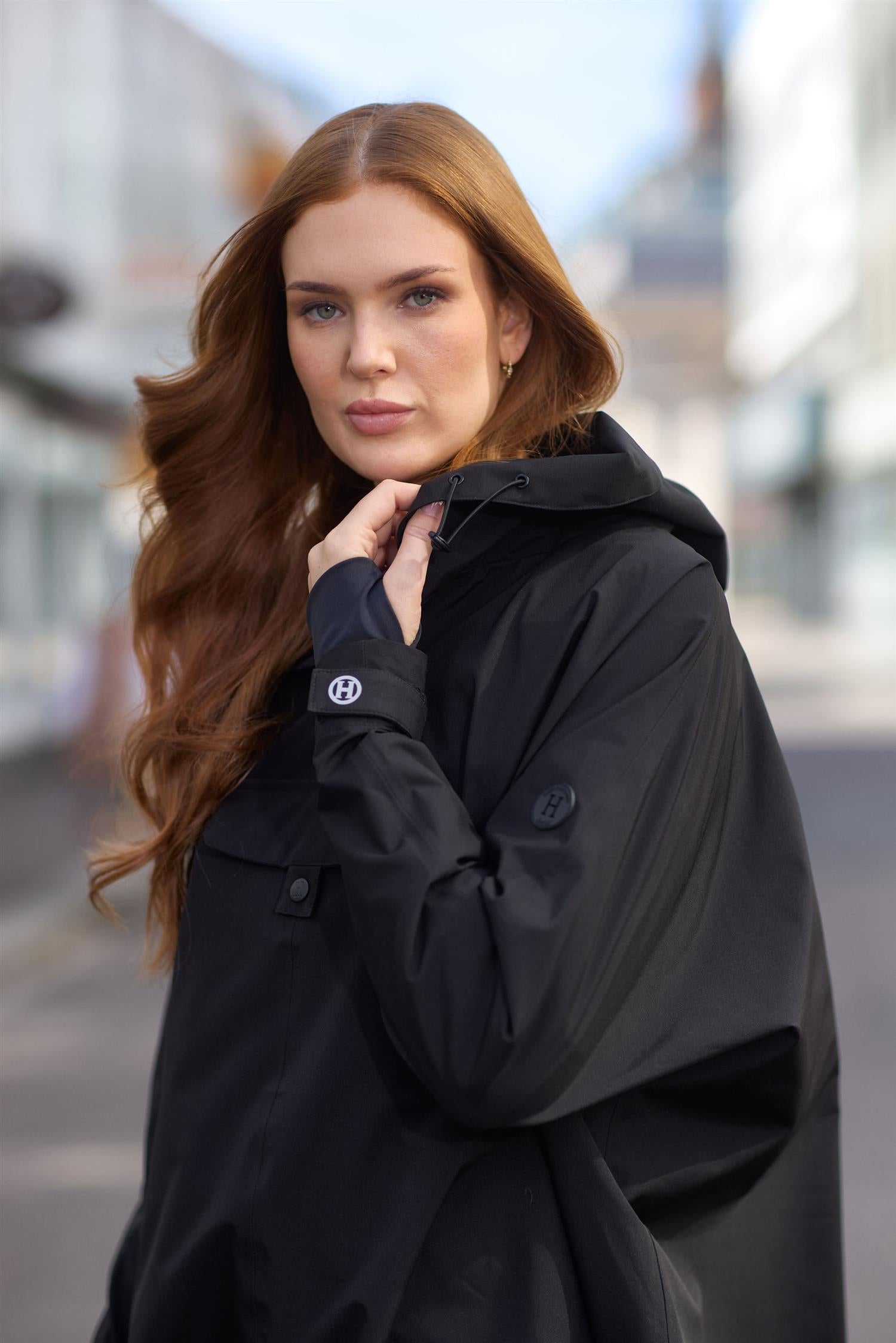 Rain cape Sort